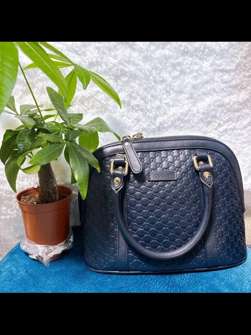 Gucci Navy Embossed GG Dome Satchel with Gold Hardware